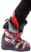 Image of Ski Boot Horn being used to put on alpine ski boot